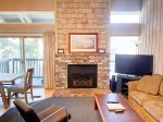 Mammoth Condo Rental Chamonix 99 - Living Room Has Large Flat Screen TV and Fireplace, Open Concept to Dining Room 